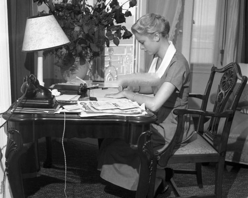 Grace Kelly in her hotel room during the 8th Cannes Film Festival-1955.